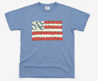 Blue t-shirt with a floral American flag design on a white background
