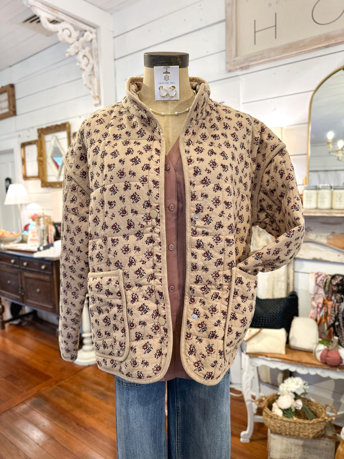 Floral patterned jacket on a mannequin in a store interior setting
cotton block print jacket 