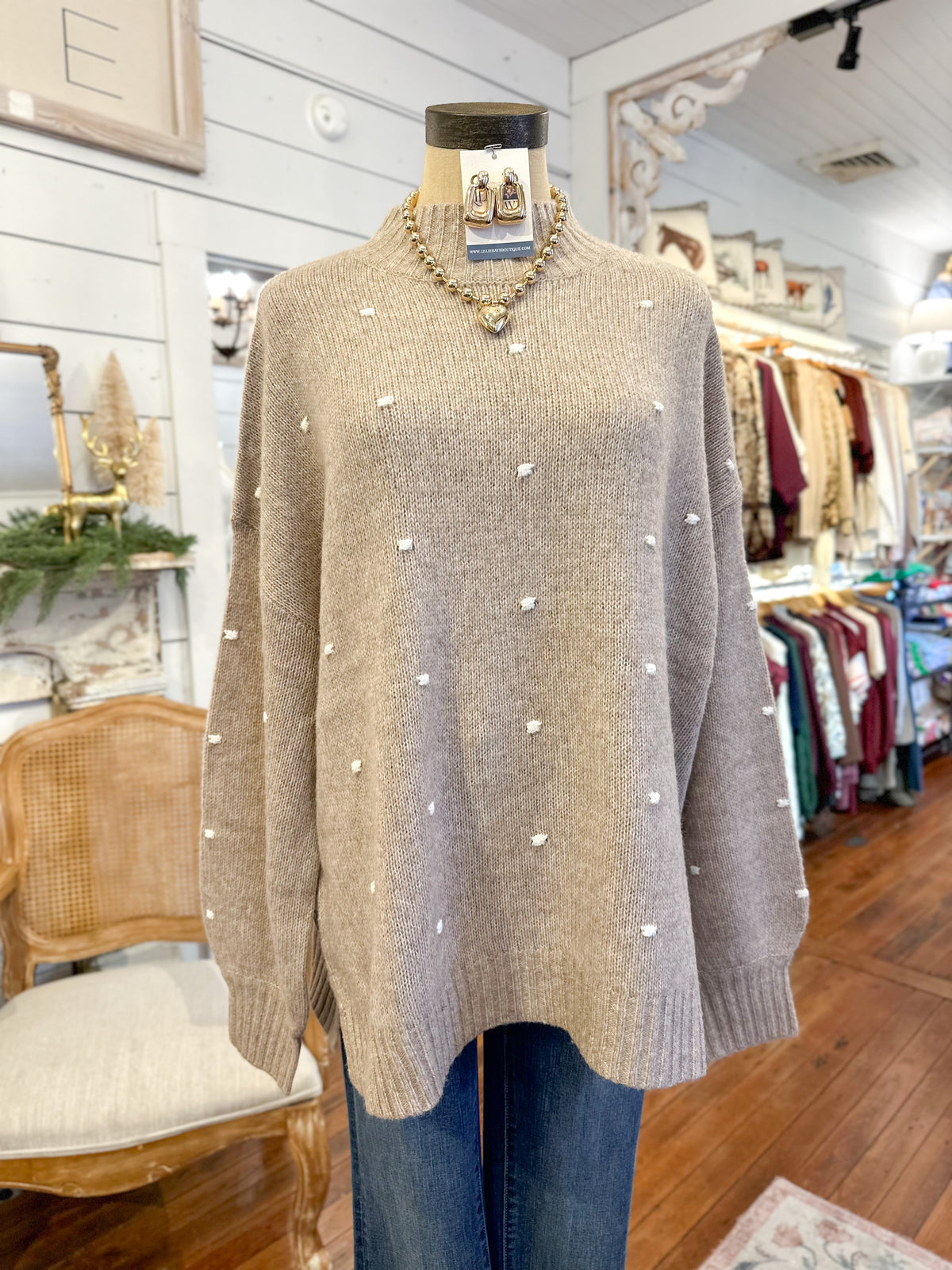 tan sweater with pom pom details mud pie novie 