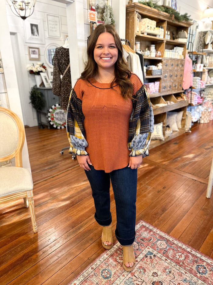 layerz clothing tammy top rust color waffle style top with plaid sleeves 