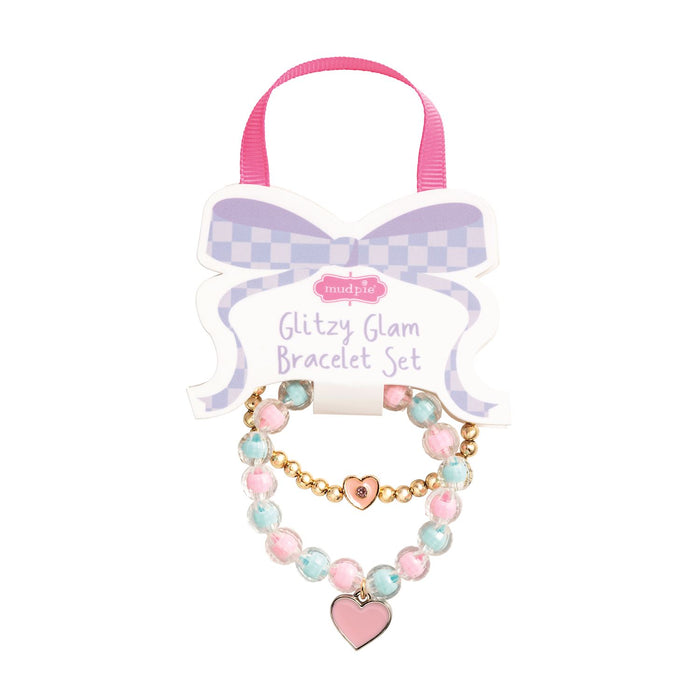 Glitzy Glam Bracelet Set with pink and gold heart charm on a white background