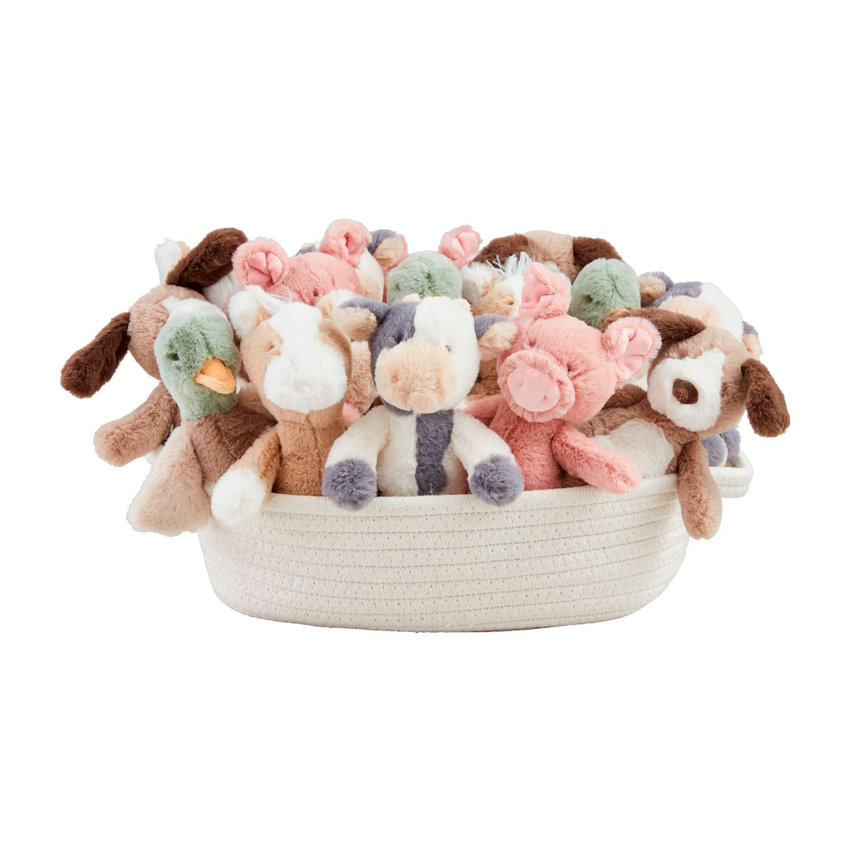Basket filled with soft toys on a white background