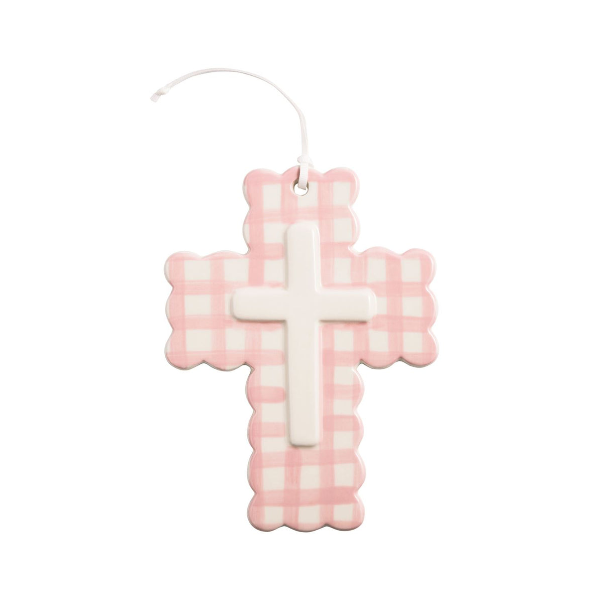 Decorative cross with pink and white checkered pattern on a white background mud pie