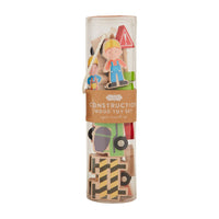Construction wood toy set in a cylindrical packaging on a white background