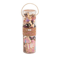 Tubular packaging with wooden toys featuring animal designs and ballet-themed elements on a white background.