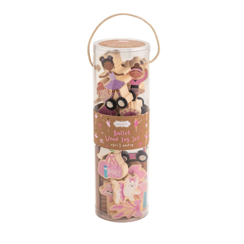 Tubular packaging with wooden toys featuring animal designs and ballet-themed elements on a white background.