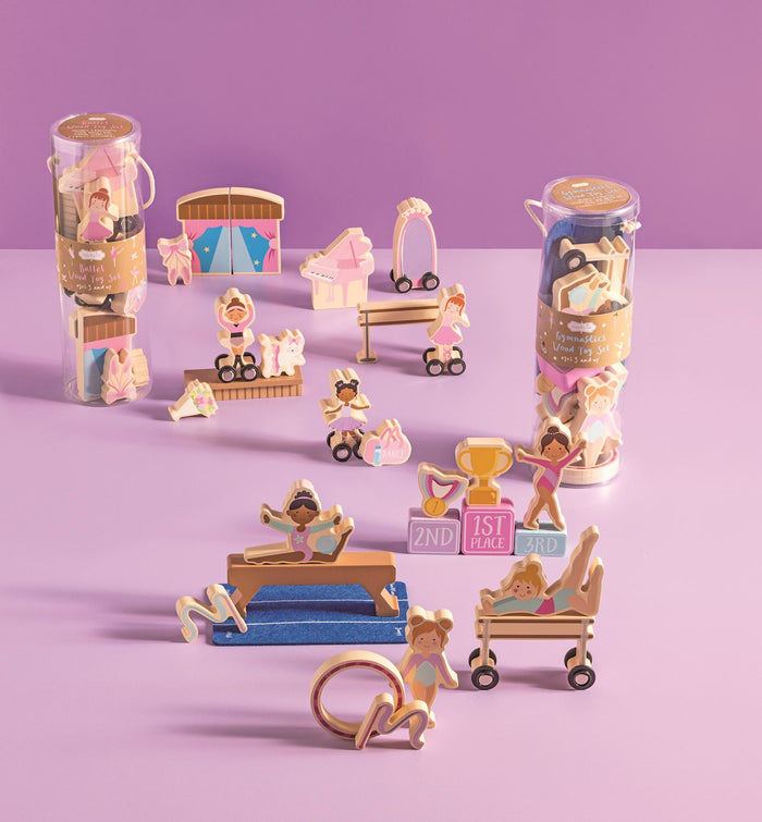 Set of toy figures and accessories on a purple background