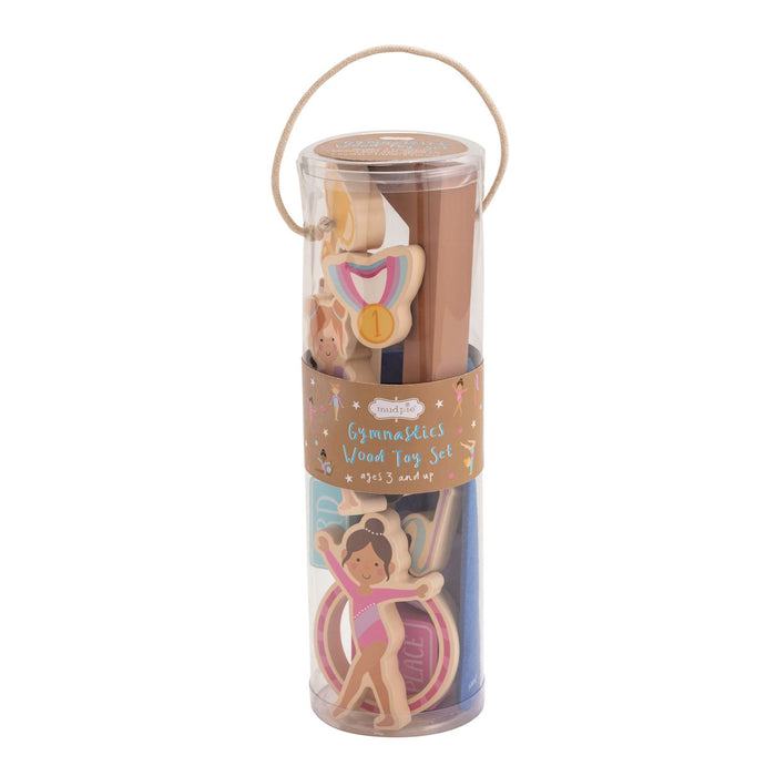 Wooden gymnast toy set in a cylindrical packaging with illustrations of a gymnast and a ball.