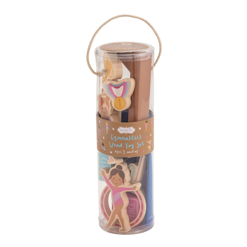 Wooden gymnast toy set in a cylindrical packaging with illustrations of a gymnast and a ball.