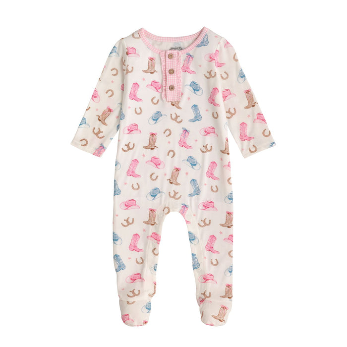 Baby one piece sleeper with cowboy boot pattern on a white background