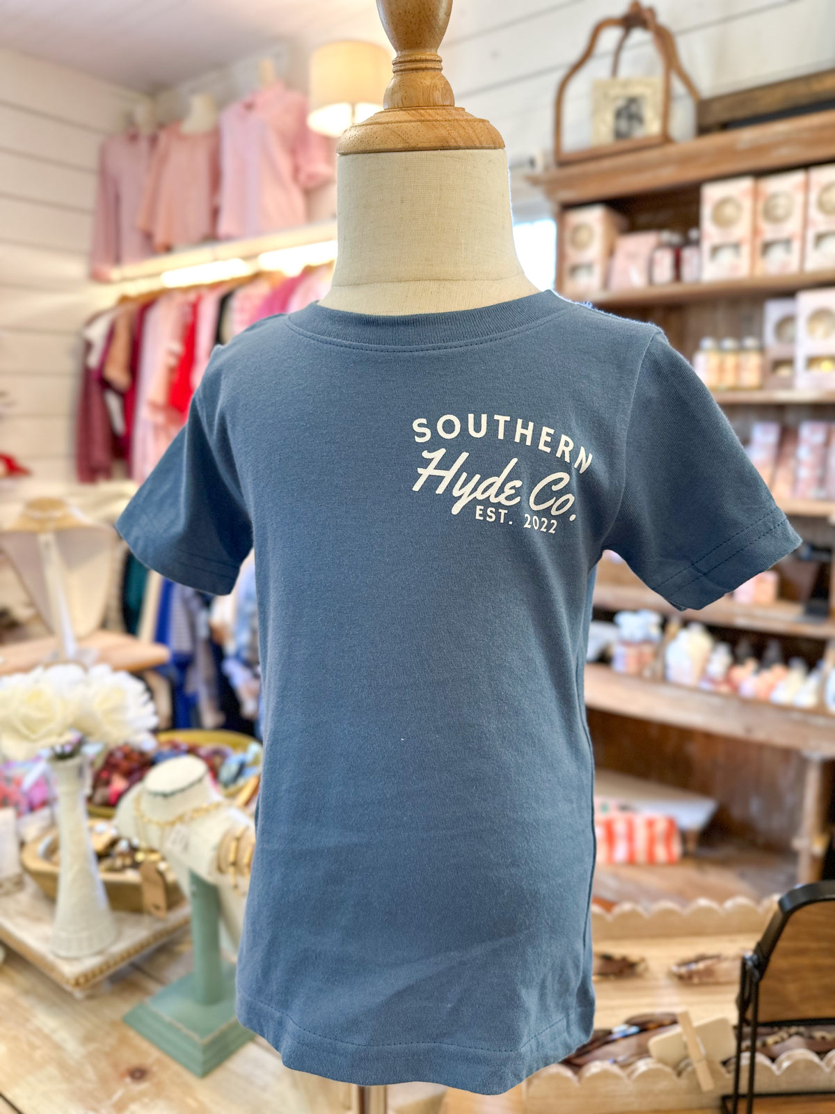 Blue front with company logo on front kids tee