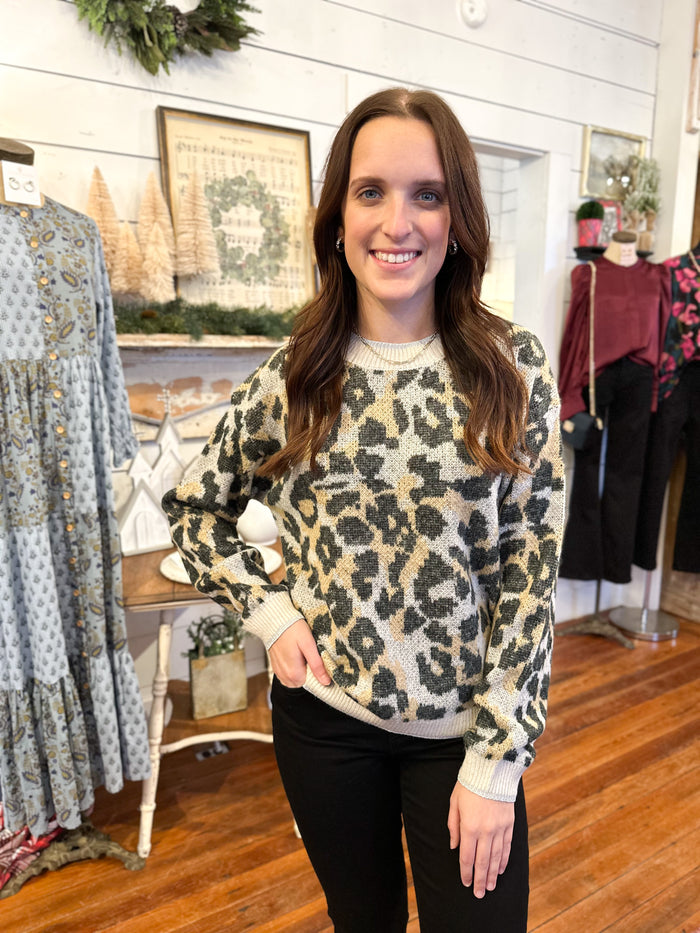 black and brown printed sweater 
