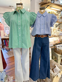 green and white, blue and white checkered top with buttons down the front and scallop hem details 