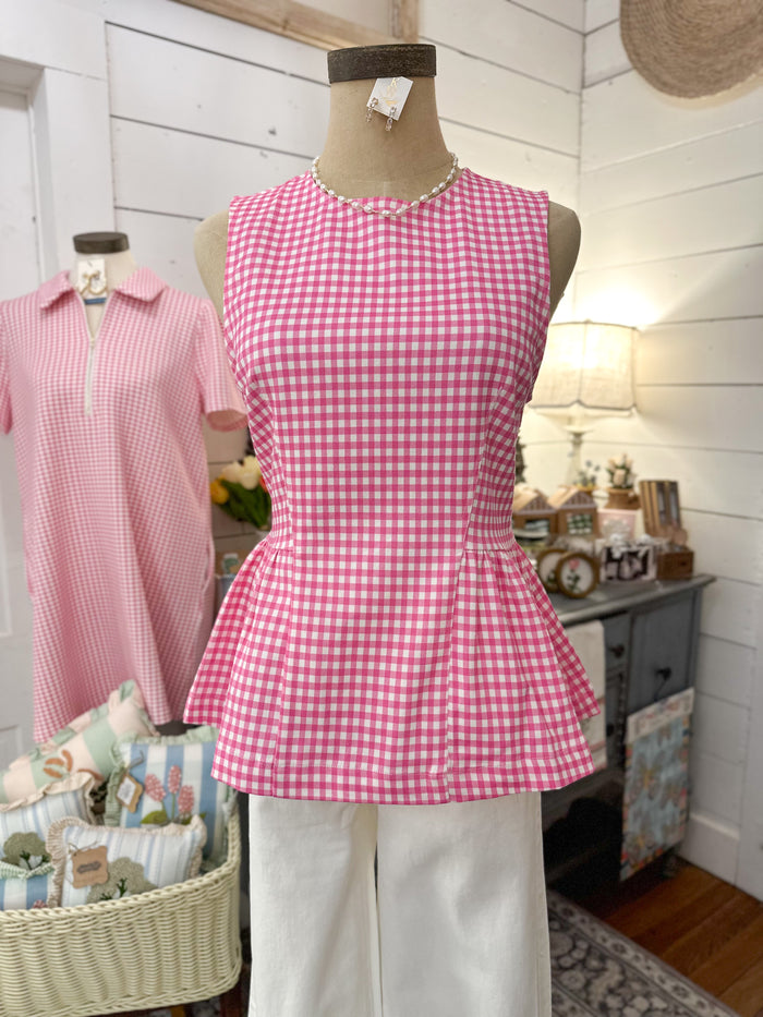 pink and white checkered peplum top with zipper on the back 