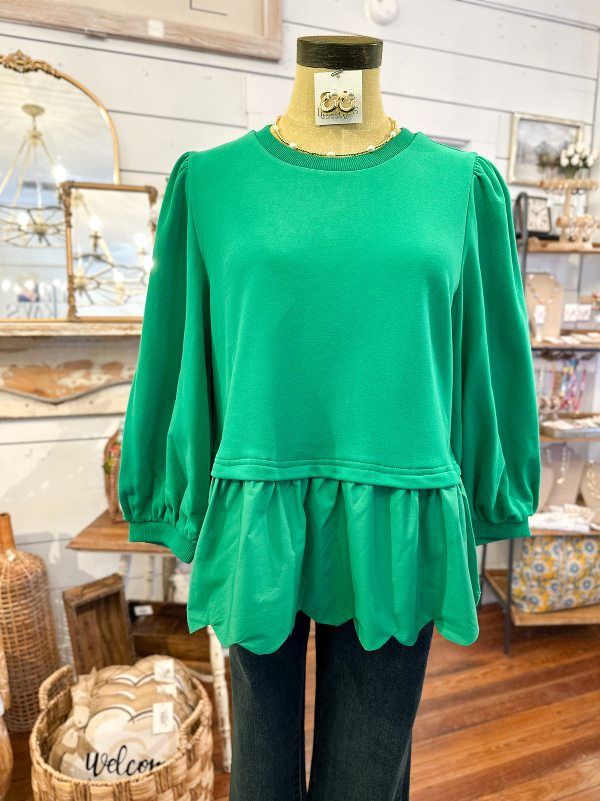 green 2 style top with ruffle hem and sweater like material top part 