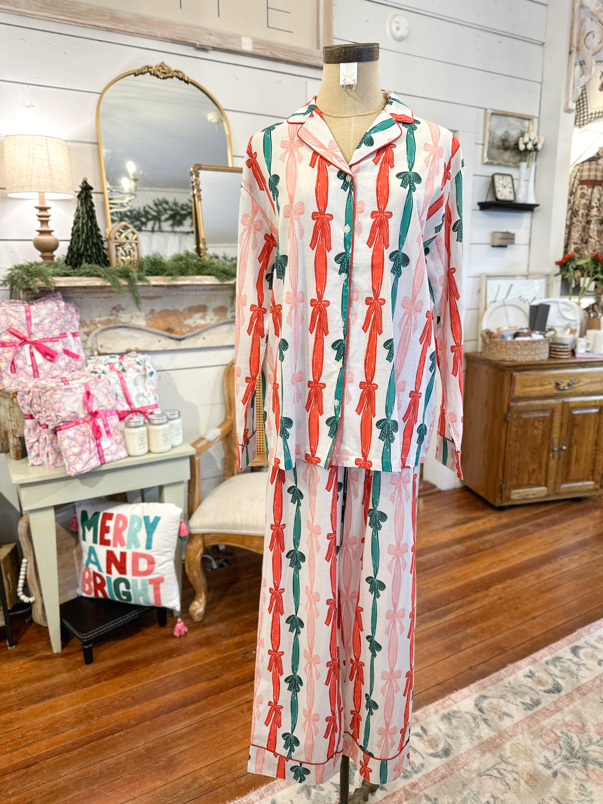 Patterned pajama set on a mannequin in a home interior setting with Christmas decorations.
layerz clothing pajama set
