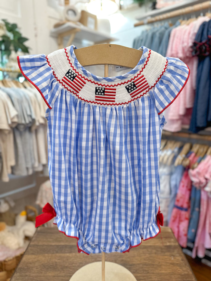blue and white checkered romper with flag embroidery details 