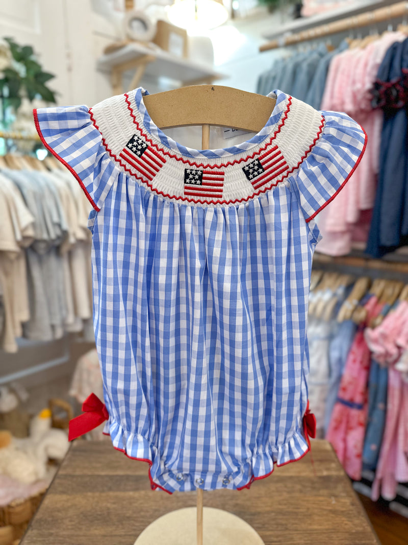blue and white checkered romper with flag embroidery details 