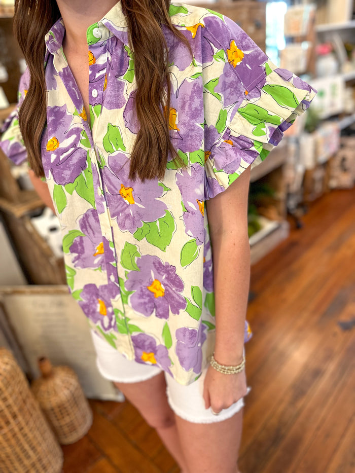 purple and green floral top with ruffle sleeves