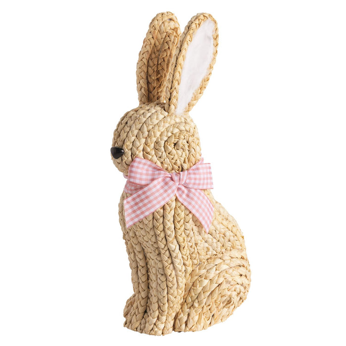 Woven rabbit decoration with a pink bow on a white background mud pie 