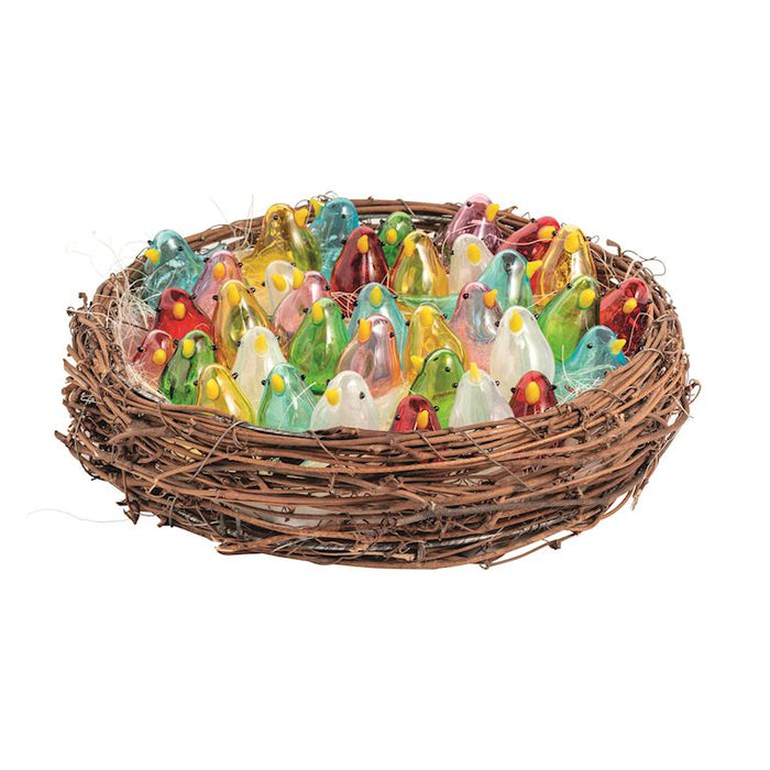 Wicker nest with colorful glass birds on a white background