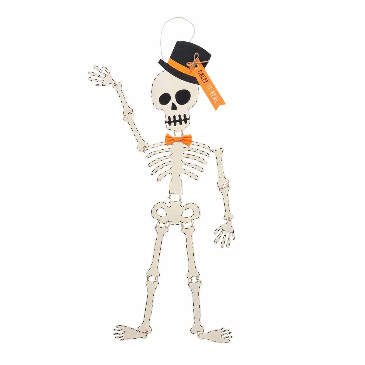 Skeleton figure with a top hat and bow tie on a white background mud pie top hat skeleton 