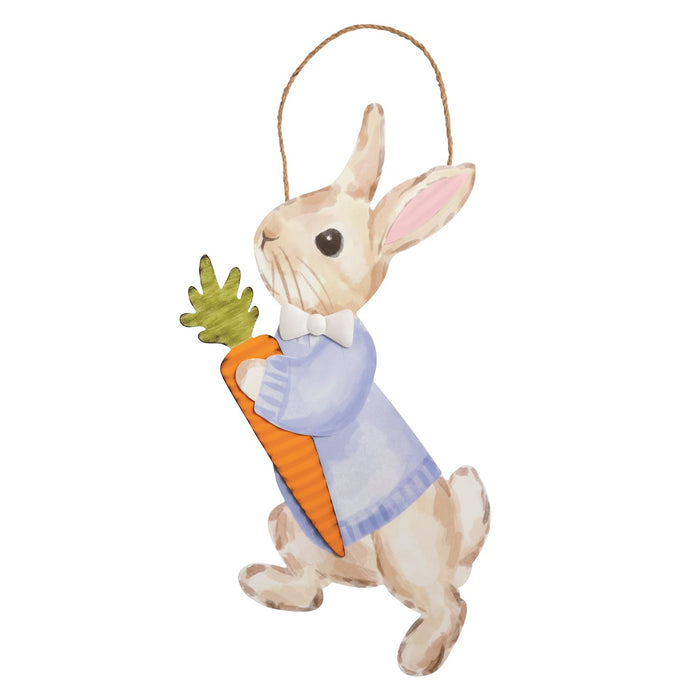 Decorative rabbit figurine holding a carrot on a white background