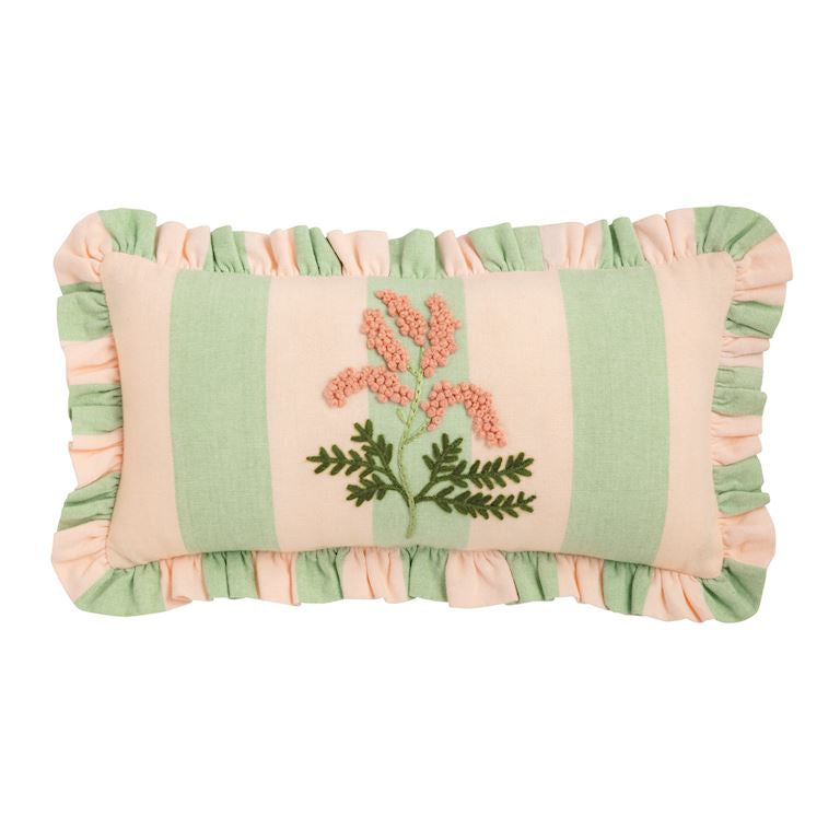 Decorative pillow with floral embroidery and ruffled edges on a white  mini size background
