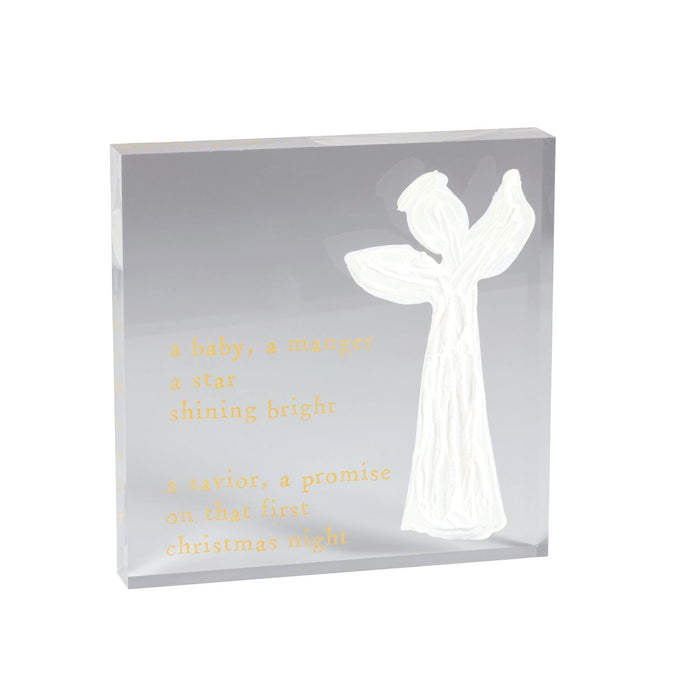 Decorative angel figure in a clear box with text on a white background