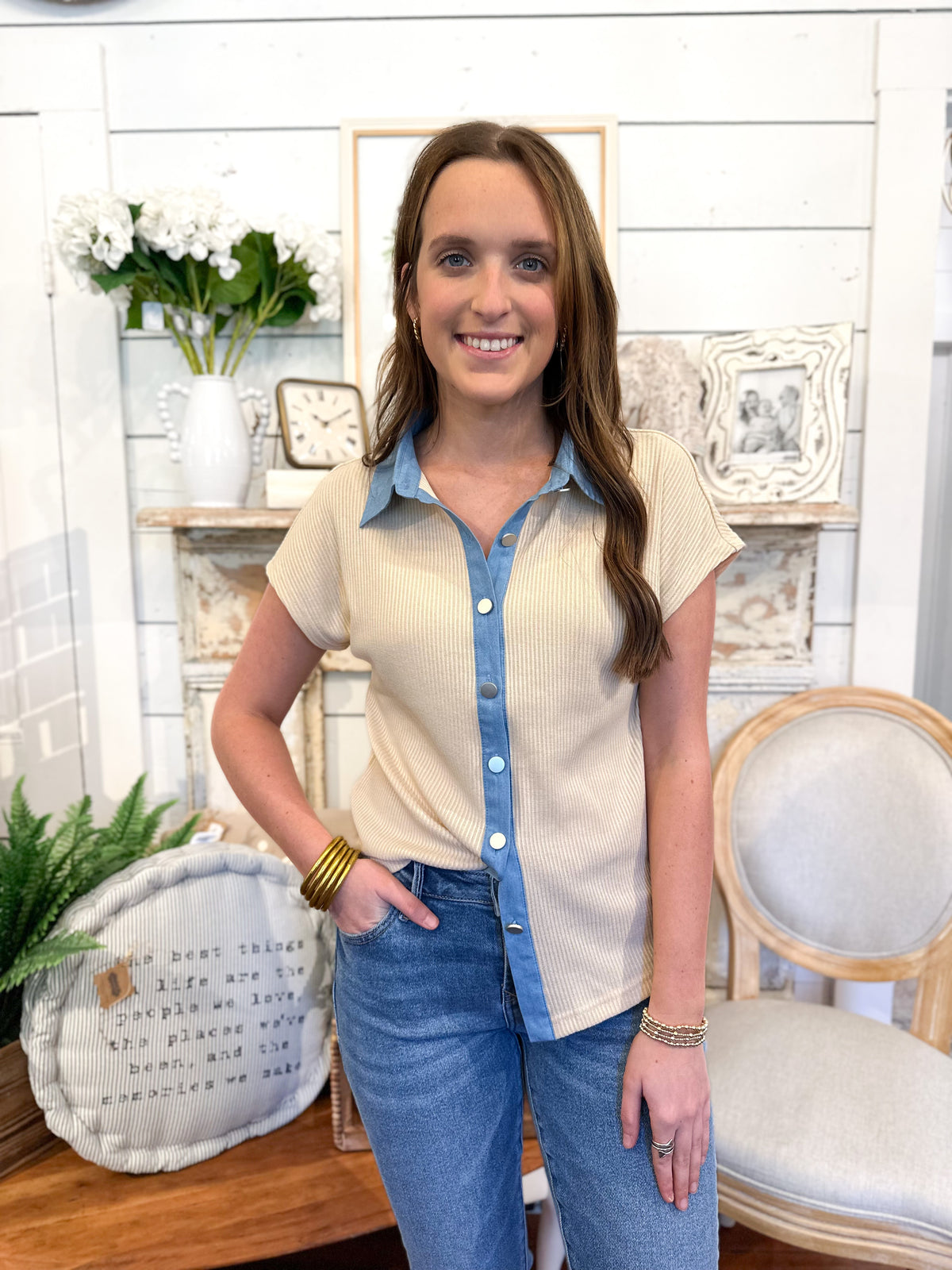 cream knit style top with denim blue collar. button down top. washco taylor top