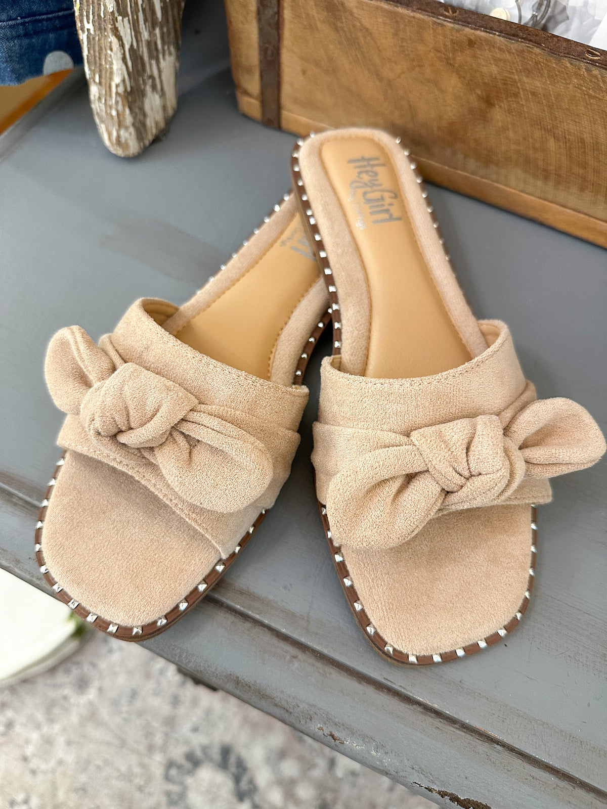 light tan suede like sandal from corkys with bow on the top

