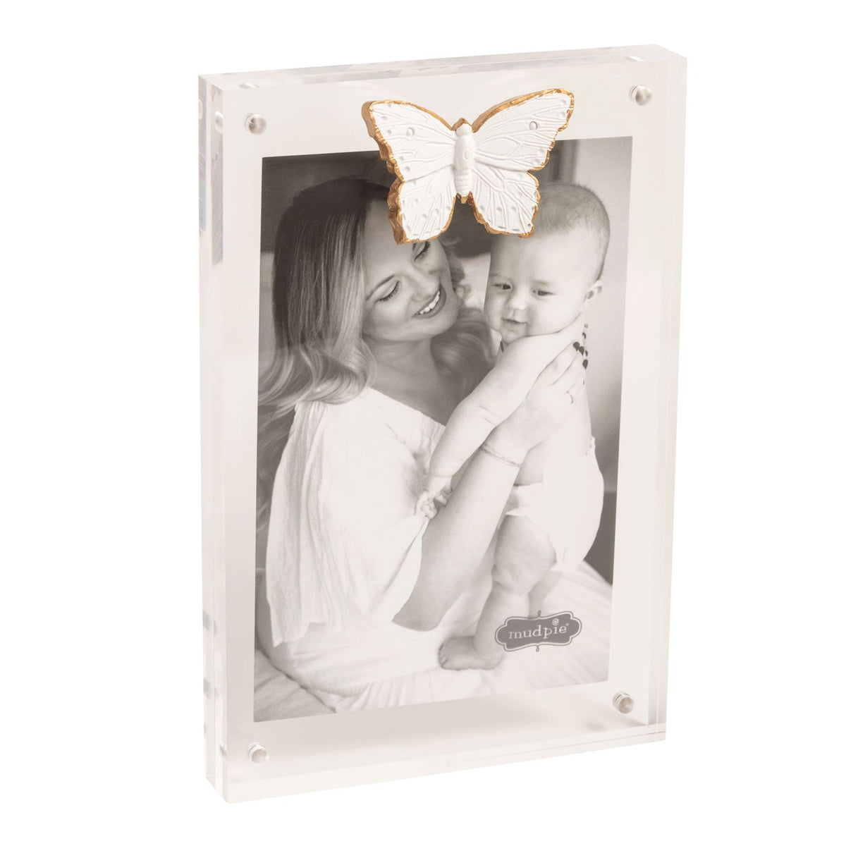 White photo frame with a black and white photo of a woman and child, and a decorative butterfly on top.