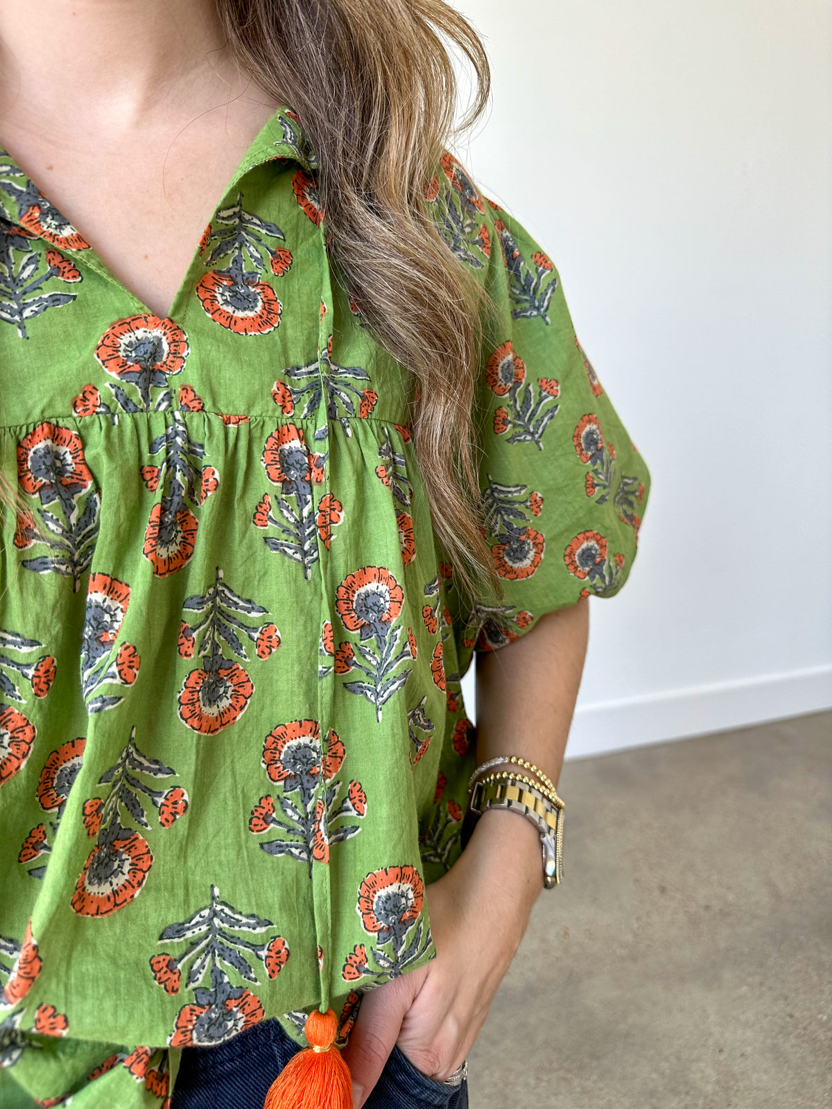 green and orange floral puff sleeve top