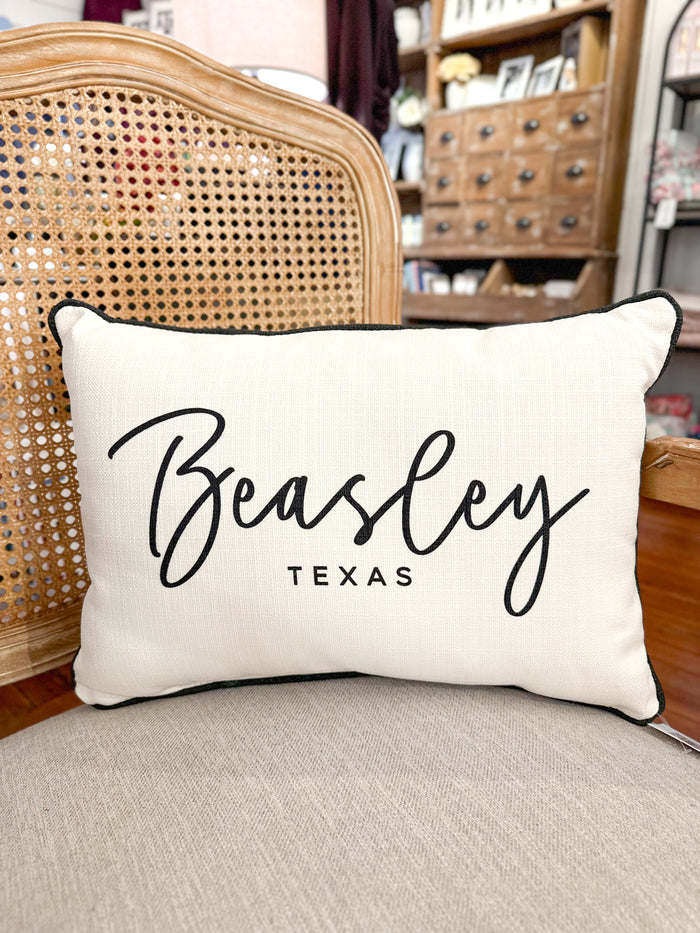 beasley texas throw pillow black and cream inside store setting 