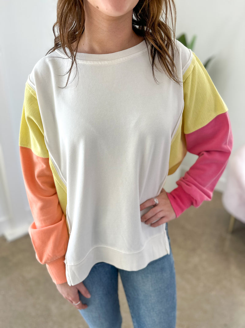 Color block pullover with yellow orange pink and white 