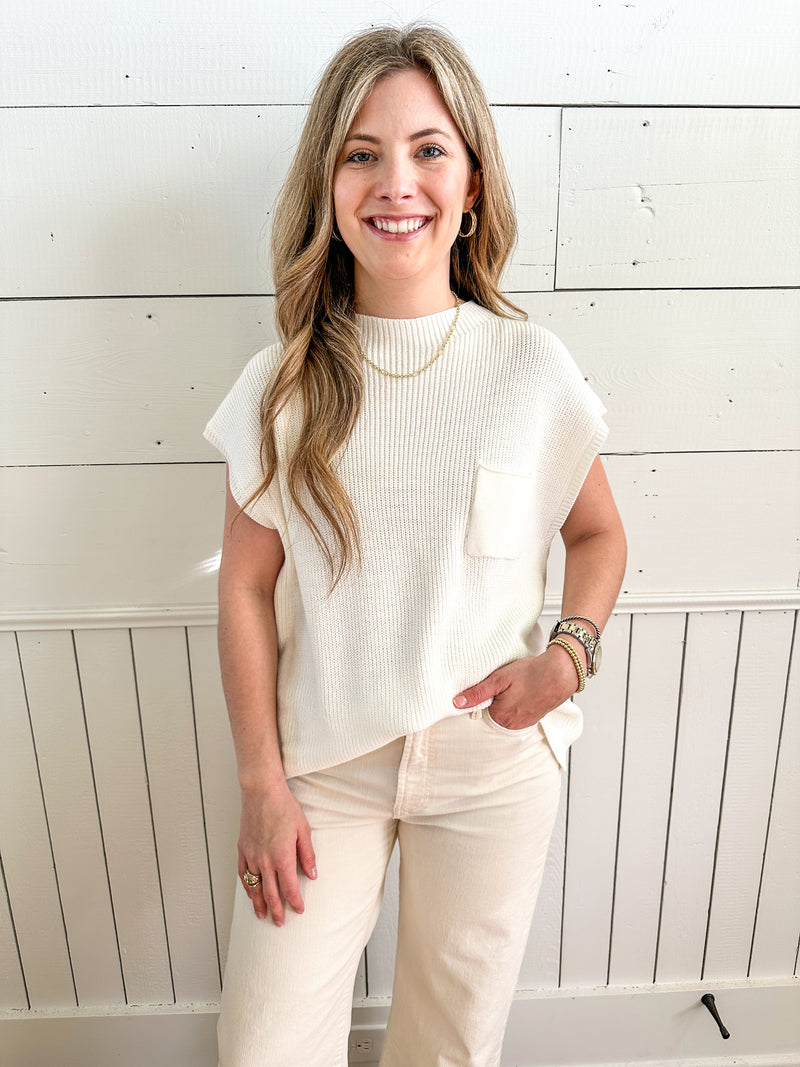 cream color short sleeve sweater top