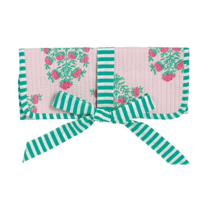 Floral and striped fabric with a bow on a white background