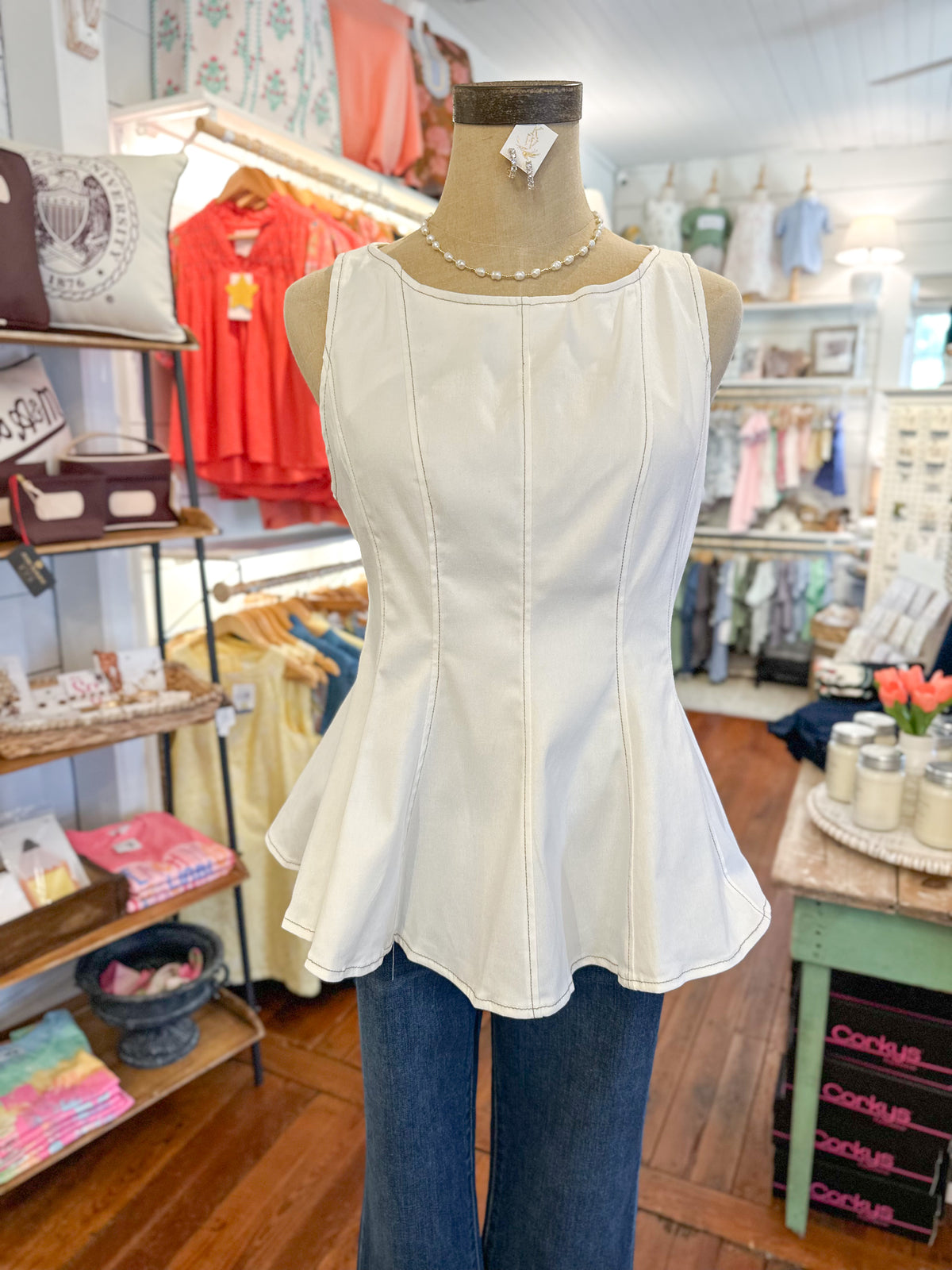 off white peplum top with zipper in the back entro brand
