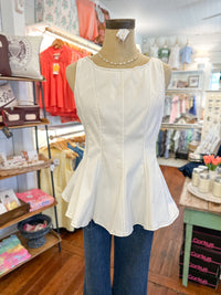 off white peplum top with zipper in the back entro brand
