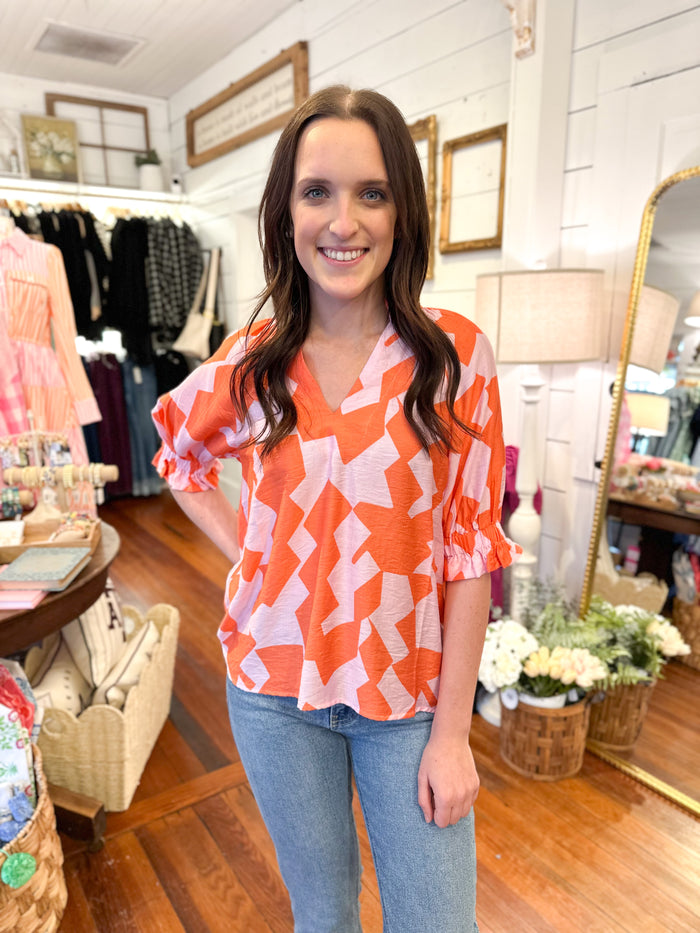 pink and orange abstract print 3 quarter sleeve top