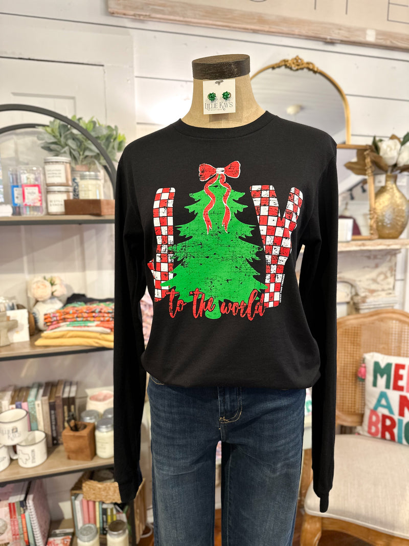 Black long-sleeve shirt with Christmas tree and candy cane design on a mannequin in a store setting.