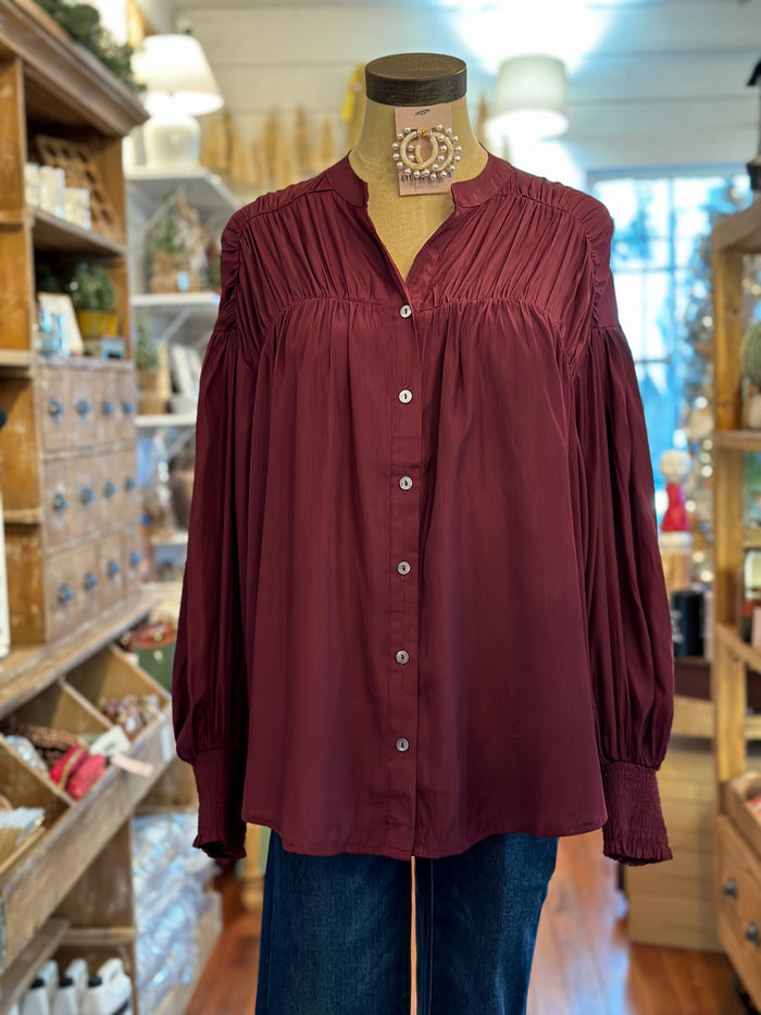 maroon long sleeve top with buttons
