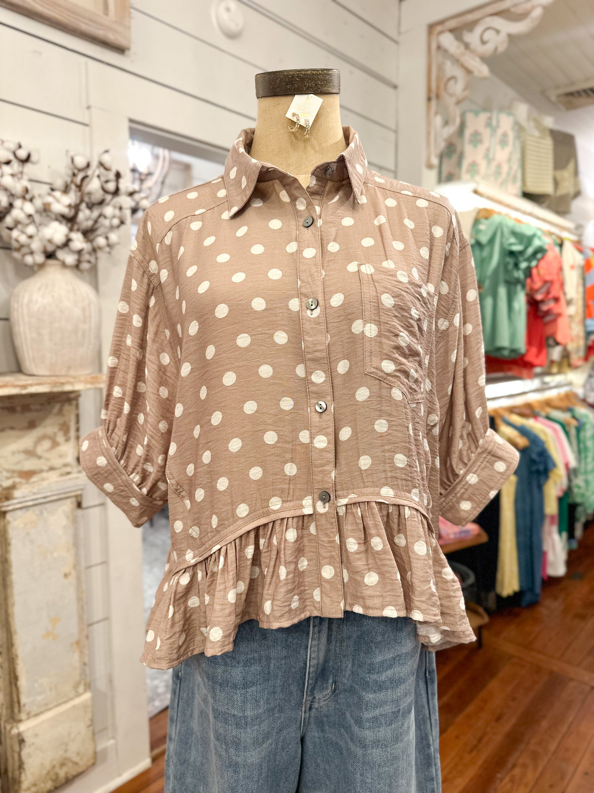 tan and cream button down polka dot top with flowy hem 
