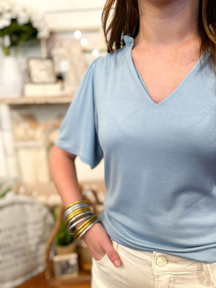 basic blue top with flowy sleeves
