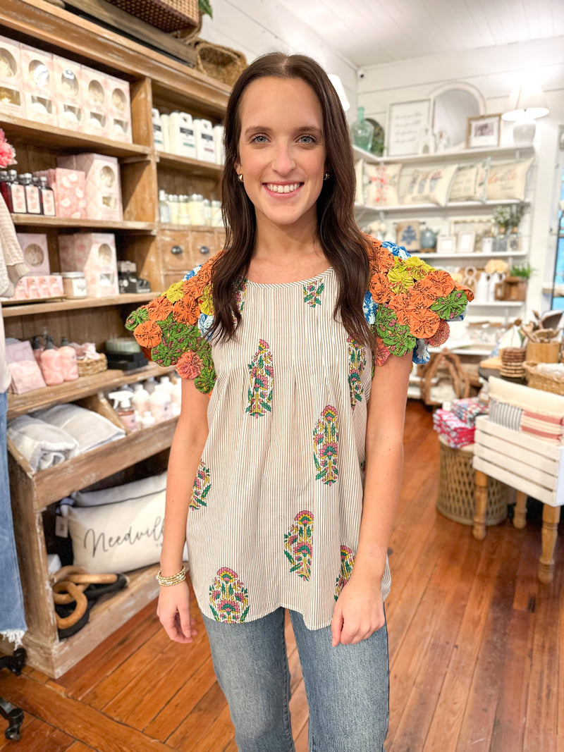 layerz clothing asher top pinwheel fabric sleeves
