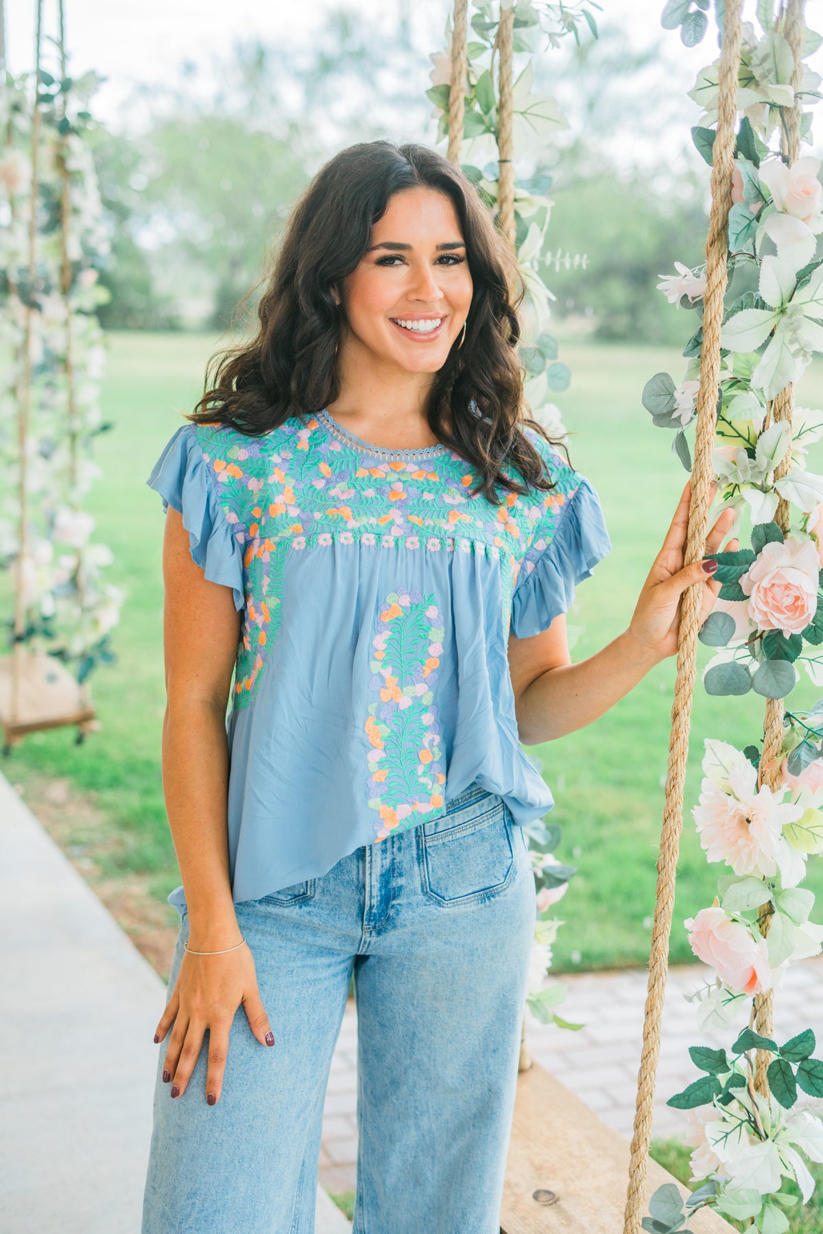 layerz clothing addie top light blue with pale multi color flowers