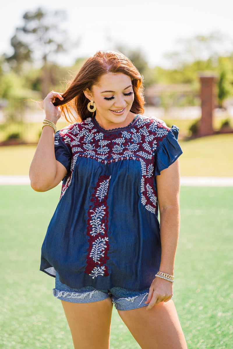 denim style top from layerz clothing with maroon details athens top