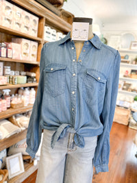 medium wash long sleeve button down top  with pearl snaps
