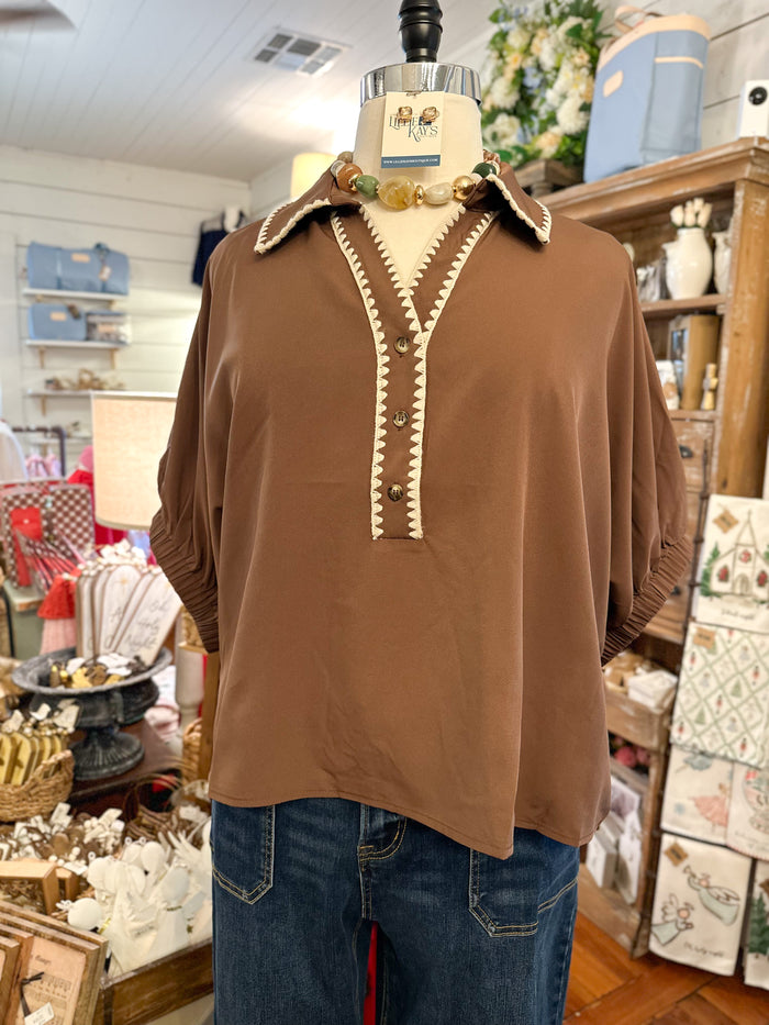 mocha color dolman sleeve blouse with cream stitching