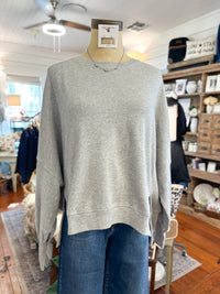 grey long sleeve pullover top with side slits for a causal fit in side boutique 
